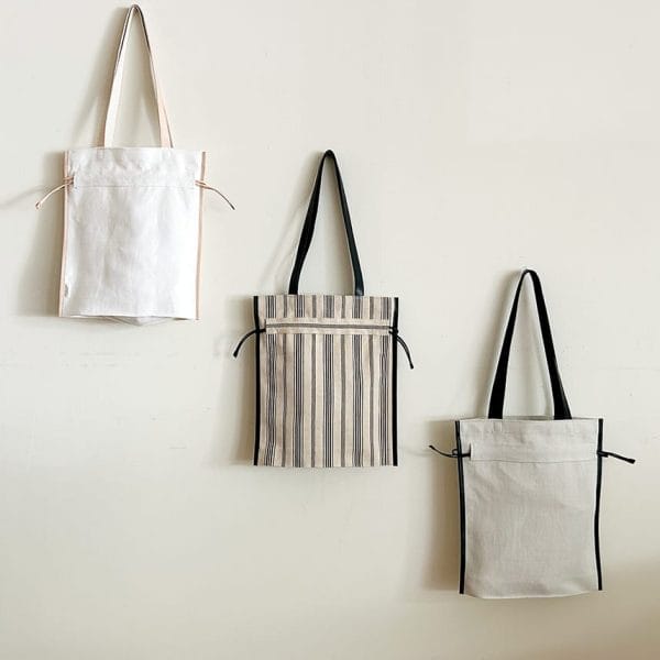 バッグ作家 冨山朋子/本革とリネンの巾着トートバッグ【チョーク】