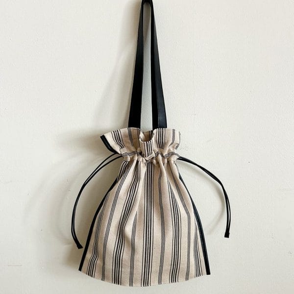 バッグ作家 冨山朋子/本革とリネンの巾着トートバッグ【パトリブラック】